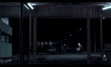 a blurred image of a green building with a sign on the wall that says ' no smoking '