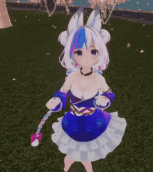 a girl in a blue and white dress is kneeling down in the grass