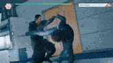 two men are fighting in a video game and one has the word defeat on his screen