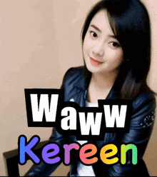 a woman is sitting in a chair with the words waww kereen below her