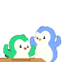a blue and green penguin are sitting at a desk
