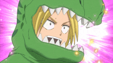 a cartoon character is wearing a green dinosaur costume with sharp teeth
