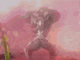 a blurry picture of a man dancing on a stage