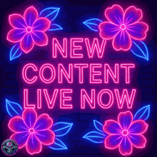 neon sign that says " new content live now "