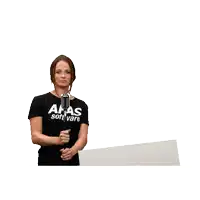 a woman singing into a microphone while holding a sign that says " simply the best "