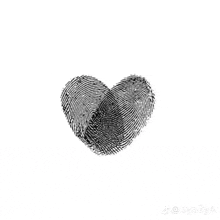 a heart shaped fingerprint on a white background