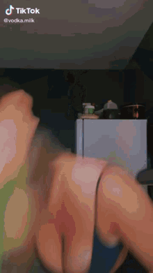 a woman 's breasts are shown on a tiktok video