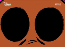 a close up of a cartoon character 's eyes with disney channel written on the bottom