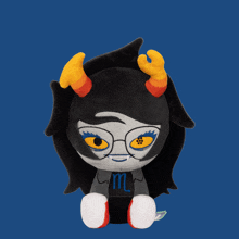 a stuffed toy with a zodiac sign on it
