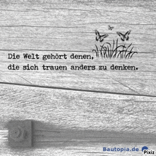 a black and white photo with a quote in german