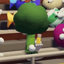 a cartoon character with a broccoli head is holding a pencil in his hand .