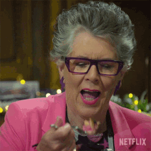 eating prue leith the great british baking show holidays taking a bite munching