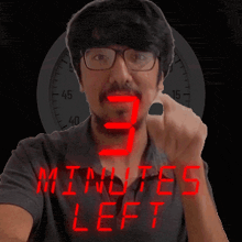 a man wearing glasses and a shirt that says " minutes left "