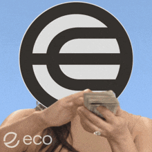 a woman holds a stack of money in front of a euro sign on her head