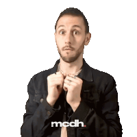 a man in a black jacket with the word mcdh on the bottom right