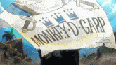 a monkey d. garp flag is being held up in the air