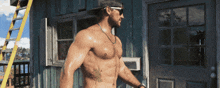 a shirtless man wearing sunglasses and a baseball cap stands in front of a building