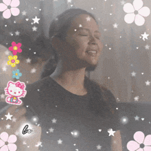 a woman with her eyes closed is surrounded by pink flowers and hello kitty stickers