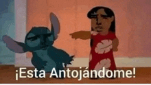 a cartoon of stitch and a woman standing next to each other with the words `` esta antojandome '' written above them .