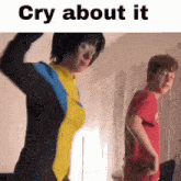 a man and a woman are dancing in a room with the words cry about it above them