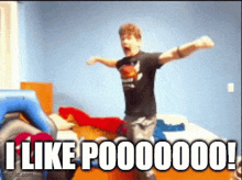 a boy is jumping on a bed with the words " i like p000000 " written below him