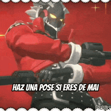 a man in a santa suit is holding a gun with the words haz una pose si eres de mai written below him