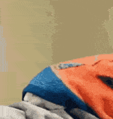 a close up of a person laying on a bed