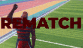 a man stands on a field with the word rematch behind him