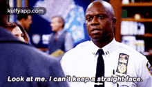 a police officer is talking to a man and says look at me i can 't keep a straight face