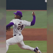 a baseball player is wearing a tigers uniform