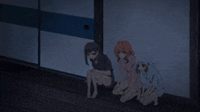 three anime girls are squatting on the floor