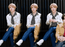 a man in a white jacket is sitting in a chair