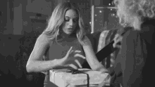 Opening Present Unwrapping GIF - Opening Present Unwrapping Gift GIFs