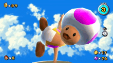 a video game screen shows a toad with a pink and white hat