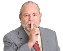 a man with a beard and mustache holds his finger to his mouth
