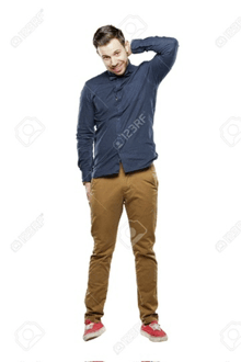 a man in a blue shirt and brown pants is standing with his hand on his head .