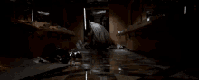 a person is crawling through a flooded bathroom in a movie scene