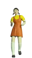 a doll in an orange dress and yellow shirt is flexing her arms