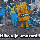 a picture of a pikachu mascot that says niko nije umoran !!!