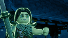 a glow in the dark lego figure with a sword in his hand