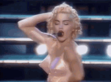 Madonna Madonnaexpressyourself GIF - Madonna Madonnaexpressyourself Madonnablondambition GIFs