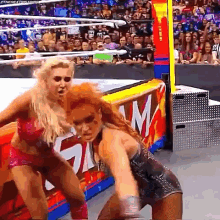 Becky Lynch Throws GIF - Becky Lynch Throws Charlotte Flair GIFs