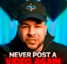 a man wearing a hat and a jacket with the words `` never post a video again '' behind him .