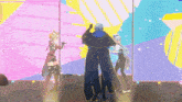 a man in a blue cape and a woman in a red dress are dancing on a stage .