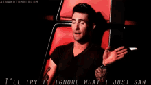 I'Ll Try To Ignore What I Just Saw GIF - The Voice Adam Levine Ignore GIFs