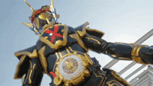 a man in a black and gold costume with a clock on his chest