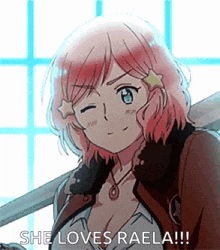 a girl with pink hair is smiling and says she loves raela !!