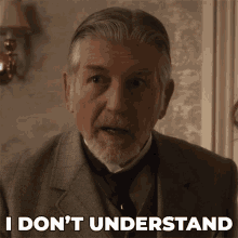 an older man in a suit and tie says i don 't understand
