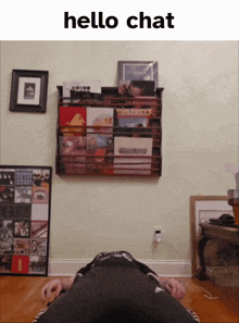 a picture of a person laying on the floor with the words hello chat below them
