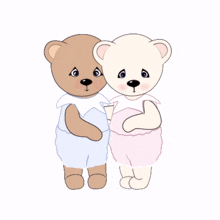 two teddy bears are standing next to each other